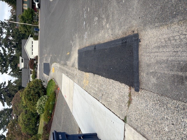 Patched road after