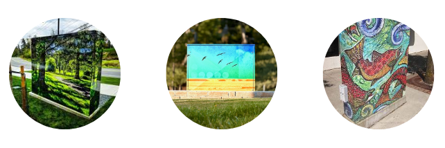 3 Circles with images of wrapped utility boxes. From left to right- first is a nature/forest scene in mostly greens. Second is a beach scene with sand, sky, and birds. Third is a salmon image. 